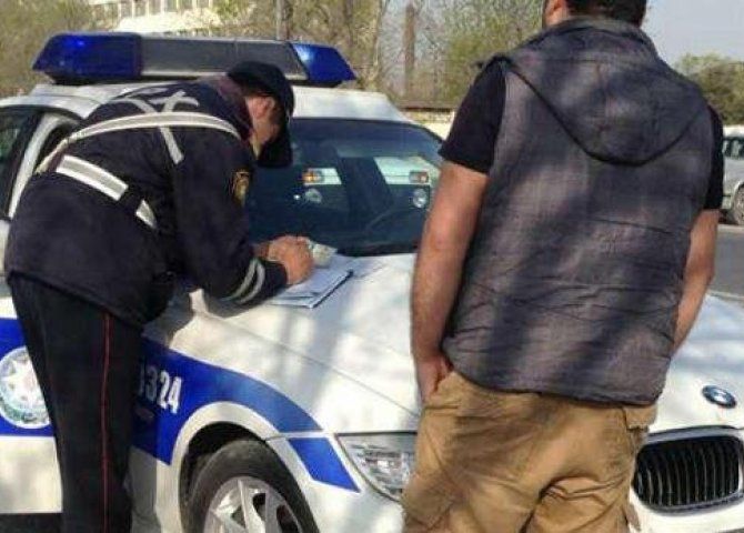 Bakıda yol polisi hamilə qadını və taksi sürücüsünü təhqir edib, cərimələdi